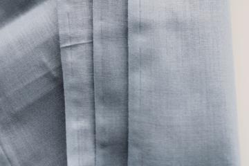 catalog photo of light chambray blue solid colored cotton fabric, vintage sewing material