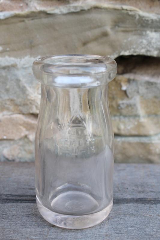 photo of little old glass milk bottle, 1/4 pint size vintage bottle w/ faint pink purple color #1