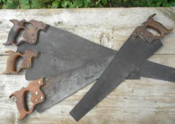 catalog photo of lot assorted old and antique woodworking hand saws thumb hole Disston etc