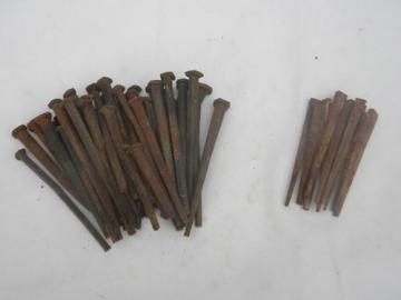 catalog photo of lot large primitive old rusty square cut nails w/forged rose heads