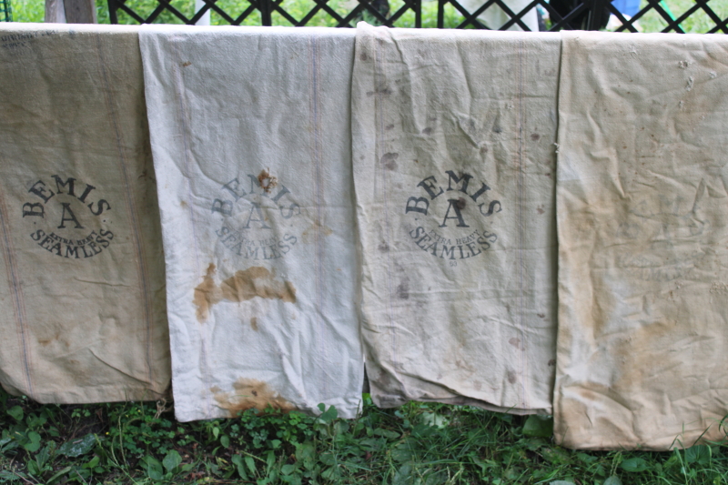 photo of lot of 12 shabby old heavy cotton grain bags, primitive fabric seed & feed sacks w/ vintage graphics  #12