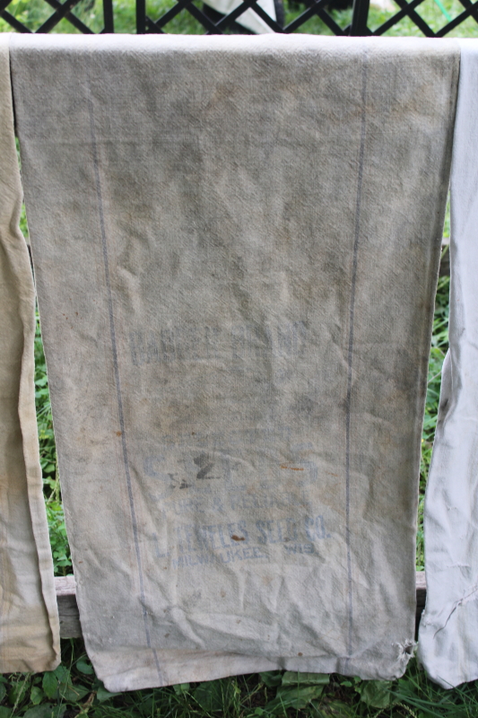 photo of lot of 12 shabby old heavy cotton grain bags, primitive fabric seed & feed sacks w/ vintage graphics  #22