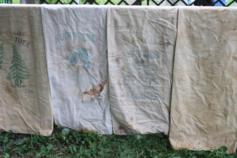 photo of lot of 12 shabby old heavy cotton grain bags, primitive fabric seed & feed sacks w/ vintage graphics  #30