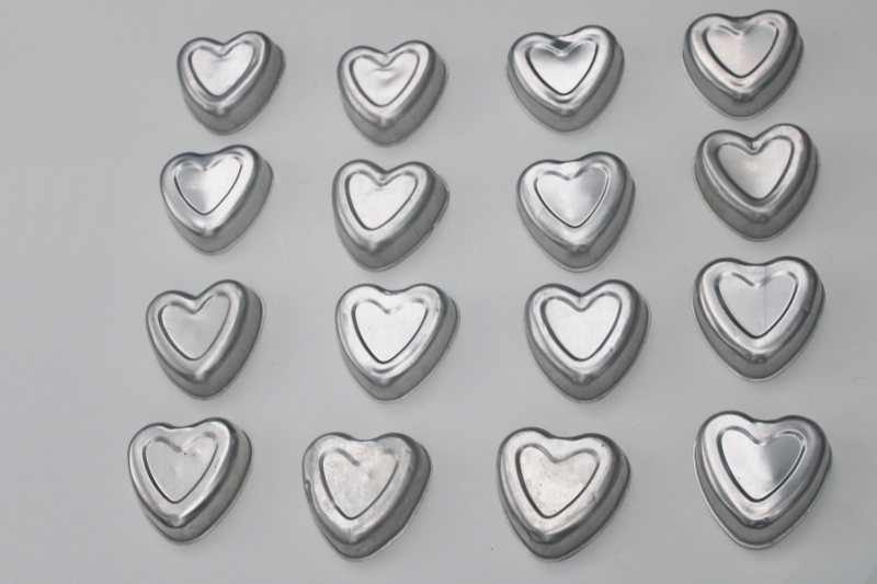 photo of  lot of 16 heart shaped molds, silver tin color primitive aluminum hearts #1