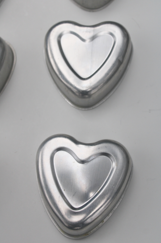 photo of  lot of 16 heart shaped molds, silver tin color primitive aluminum hearts #3