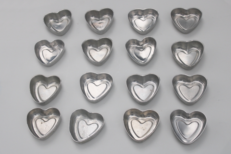 photo of  lot of 16 heart shaped molds, silver tin color primitive aluminum hearts #5