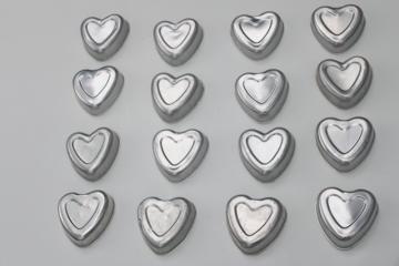 catalog photo of  lot of 16 heart shaped molds, silver tin color primitive aluminum hearts