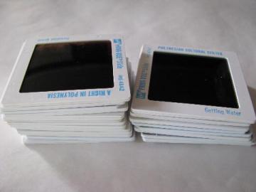 catalog photo of lot of 20+ vintage photo slides of Hawaii, hula dancers, Polynesian village etc.