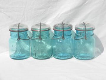 catalog photo of lot of 4 antique blue Ball Ideal fruit jars, lightning lids & 1908 patent