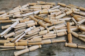 catalog photo of lot of 50 old hardwood clothespins, vintage wire wrapped peg type clothespins 