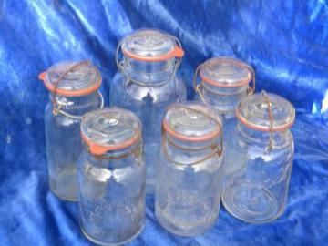 catalog photo of lot of 6 old glass mason jar storage canisters w/wire bale lightning lids