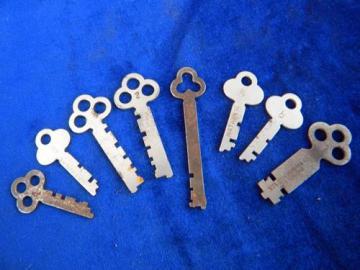 catalog photo of lot of 8 antique National Cash Register Co keys