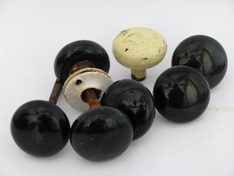 photo of lot of antique black porcelain doorknobs, vintage architectural hardware #1