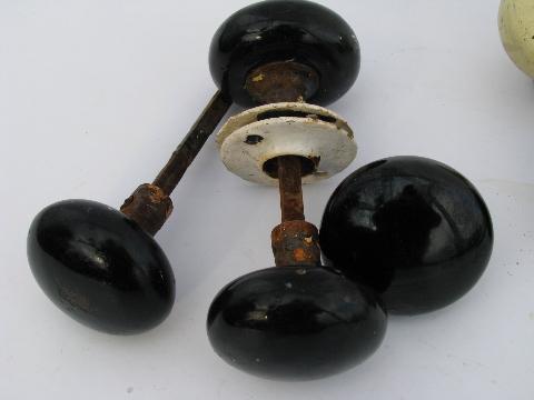 photo of lot of antique black porcelain doorknobs, vintage architectural hardware #3