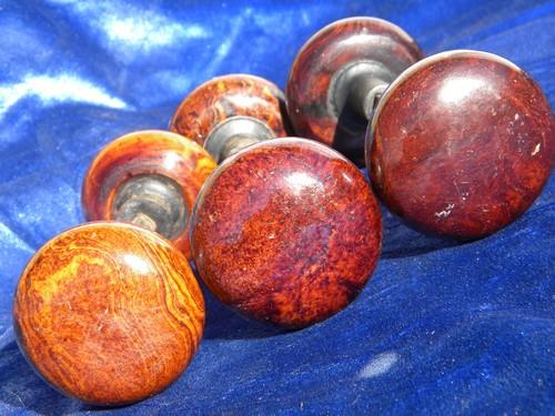 photo of lot of antique brown swirl door knobs, vintage architectural hardware #2