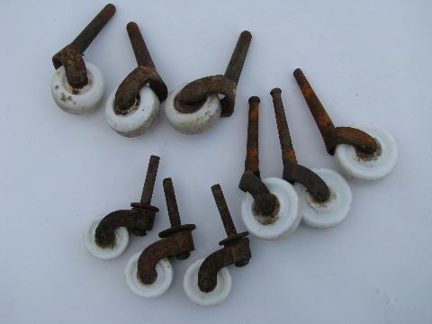 photo of lot of antique furniture casters with white ironstone porcelain wheels #1