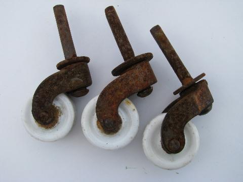 photo of lot of antique furniture casters with white ironstone porcelain wheels #2