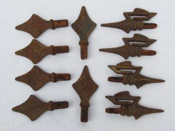 catalog photo of lot of antique vintage cast iron curtain rod finials