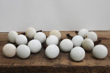 catalog photo of lot of antique white porcelain doorknobs w/ rusty hardware shabby worn vintage door knobs 