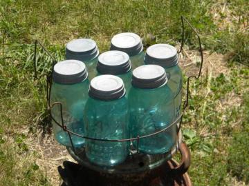 catalog photo of lot of aqua blue Ball Perfect Mason jars w/zinc caps in wire canner basket