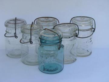 catalog photo of lot of assorted antique 1 pint canning jars with glass & wire lids