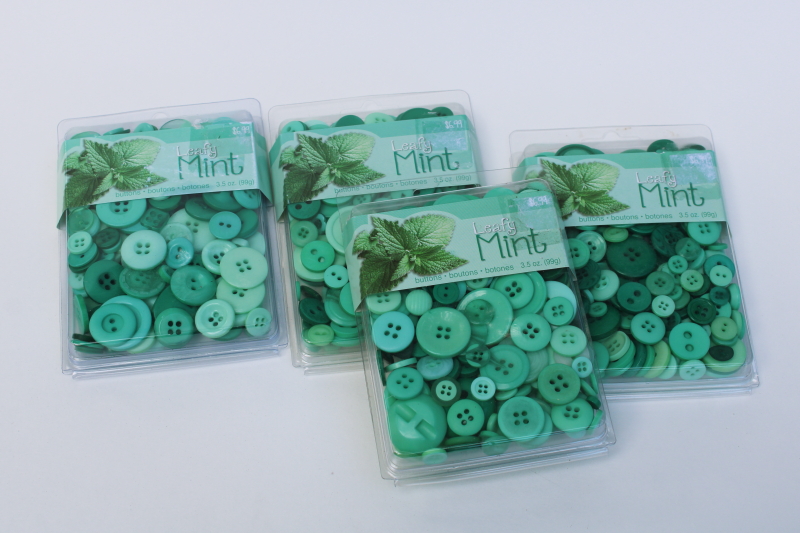 photo of lot of assorted mint green plastic buttons new in package craft supplies for collage, sewing etc #1