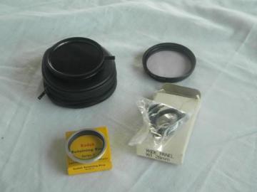 catalog photo of lot of assorted photography camera filters and parts Hoya, Kodak etc