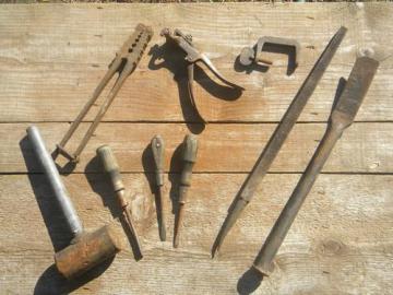 catalog photo of lot of assorted primitive old tools saw setter, tubing clamp tool etc