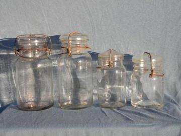 catalog photo of lot of assorted vintage glass storage jars or kitchen/pantry canisters