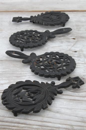 photo of lot of mini cast iron trivets, vintage kitchen trivet set made in Japan #1