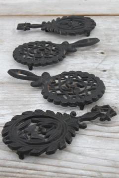 catalog photo of lot of mini cast iron trivets, vintage kitchen trivet set made in Japan