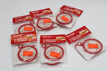 catalog photo of lot of new old stock red plastic round mini frames, Christmas ornaments for cross stitch embroidery or photos 