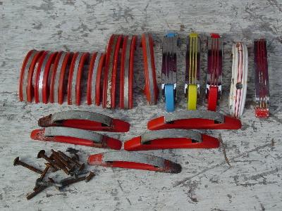 photo of lot of old Hoosier handles red and chrome #1