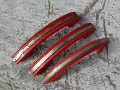 photo of lot of old Hoosier handles red and chrome #4