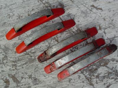 photo of lot of old Hoosier handles red and chrome #6