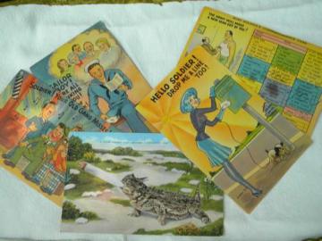 catalog photo of lot of old WWII vintage soldier&sailor postcards w/pinup art&graphics