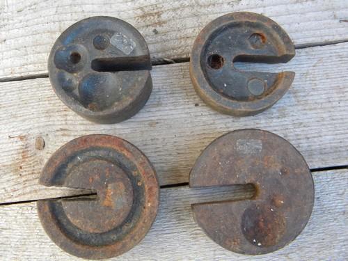 photo of lot of old iron scale weights for farm or feed mill platform or beam scale #4