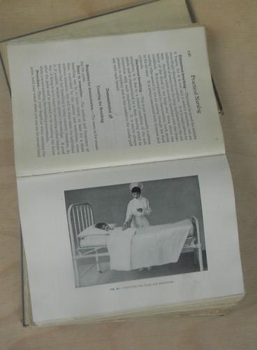 photo of lot of old medical nursing books w/photos children's hospital #7