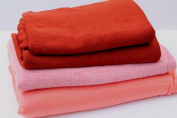 catalog photo of lot of retro 80s vintage sweater knit fabric - pink, coral, rust colors