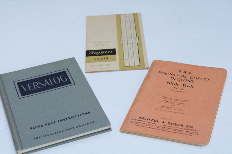 photo of lot of slide rule manuals instruction books, Post Versalog, K&E Polyphase Duplex, Aristo Studio #1