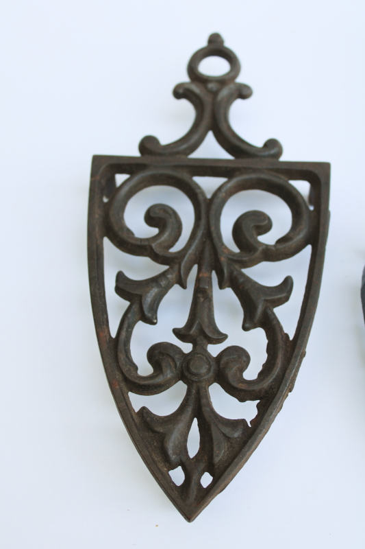 photo of lot of three old cast iron trivets for sadirons or pots & pans, vintage kitchen wall art #2