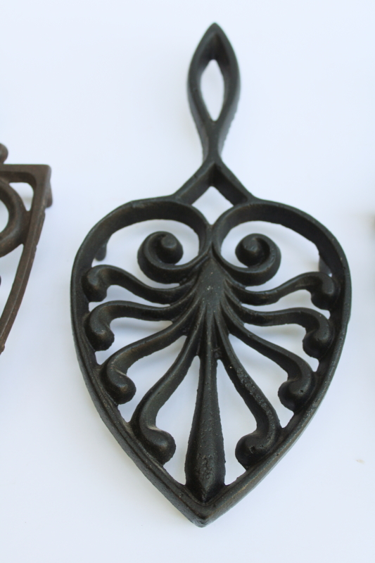photo of lot of three old cast iron trivets for sadirons or pots & pans, vintage kitchen wall art #3