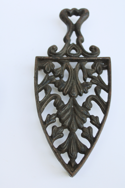 photo of lot of three old cast iron trivets for sadirons or pots & pans, vintage kitchen wall art #4