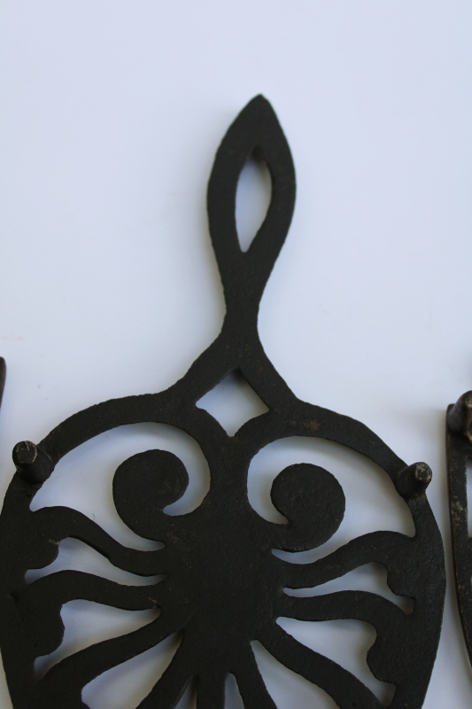 photo of lot of three old cast iron trivets for sadirons or pots & pans, vintage kitchen wall art #7