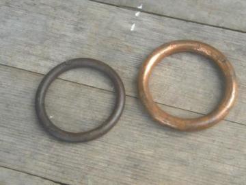 catalog photo of lot of vintage bull nose rings solid copper/bronze/red brass