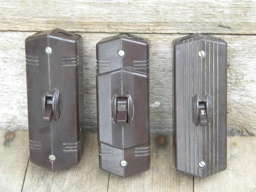 photo of lot of vintage deco bakelite architectural surface mount switches #1
