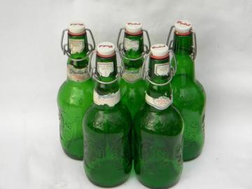 catalog photo of lot of vintage green glass Grolsch flip top beer bottles for homebrew
