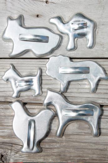 photo of lot of vintage metal cookie cutters, old aluminum cookie cutters w/ red handles etc. #2