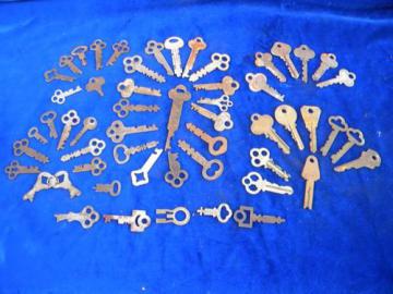 catalog photo of lot of vintage old unusual box, chest & padlock keys