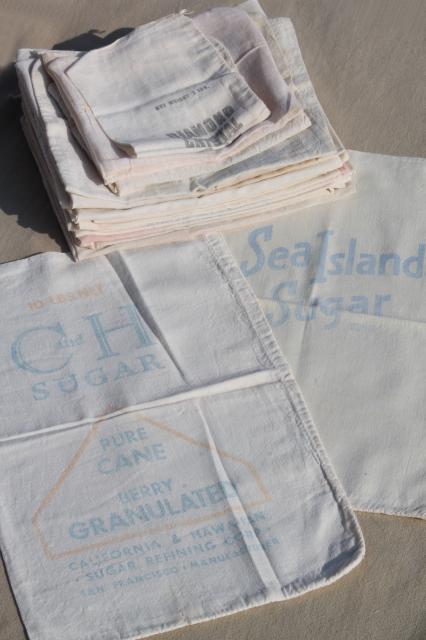 photo of lot of vintage sugar sacks w/ printed advertising graphics, fine light cotton feedsack fabric  #1